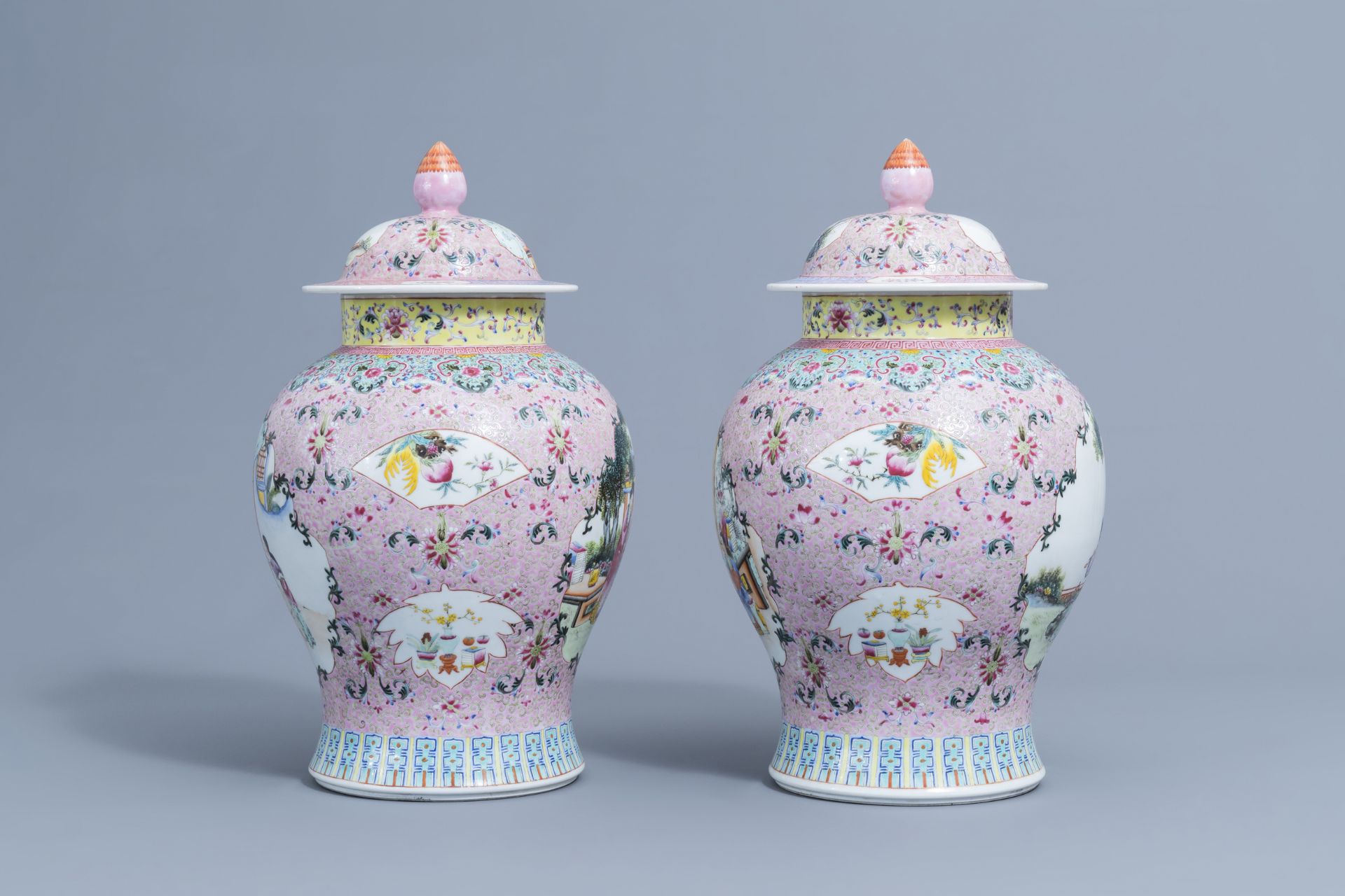 A pair of Chinese famille rose vases and covers with ladies, Qianlong mark, 20th C. - Image 2 of 8