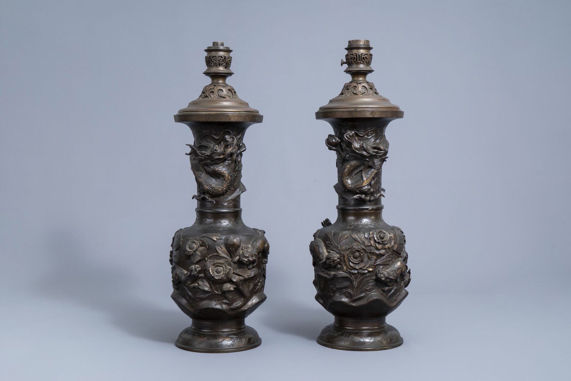 A pair of impressive Japanese partly gilt bronze vases with Gagneau mounts, Meiji, 19th C.