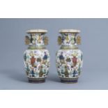 A pair of Chinese cloisonne vases with antiquities design, ca. 1900