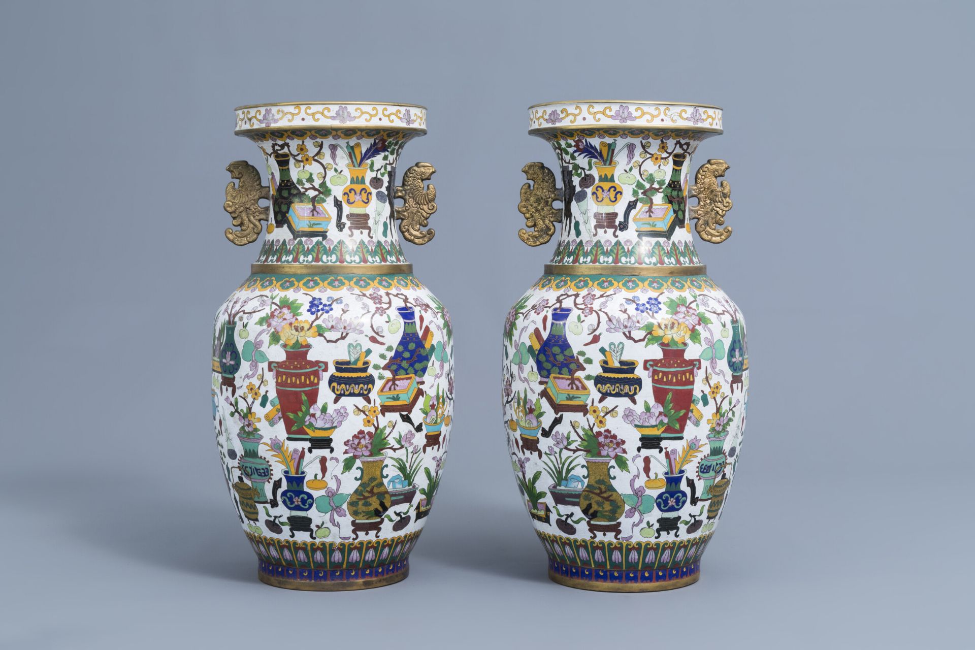 A pair of Chinese cloisonne vases with antiquities design, ca. 1900