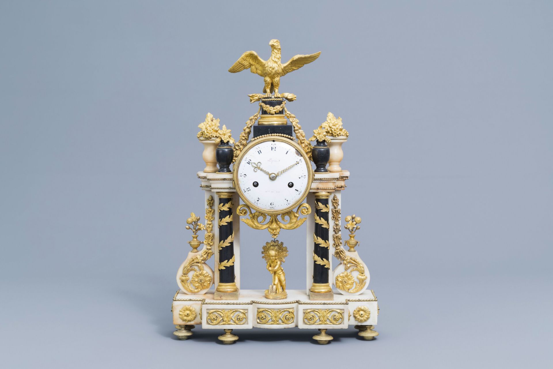A French Louis XVI gilt bronze mounted white and black marble portico clock with an eagle, ca. 1800