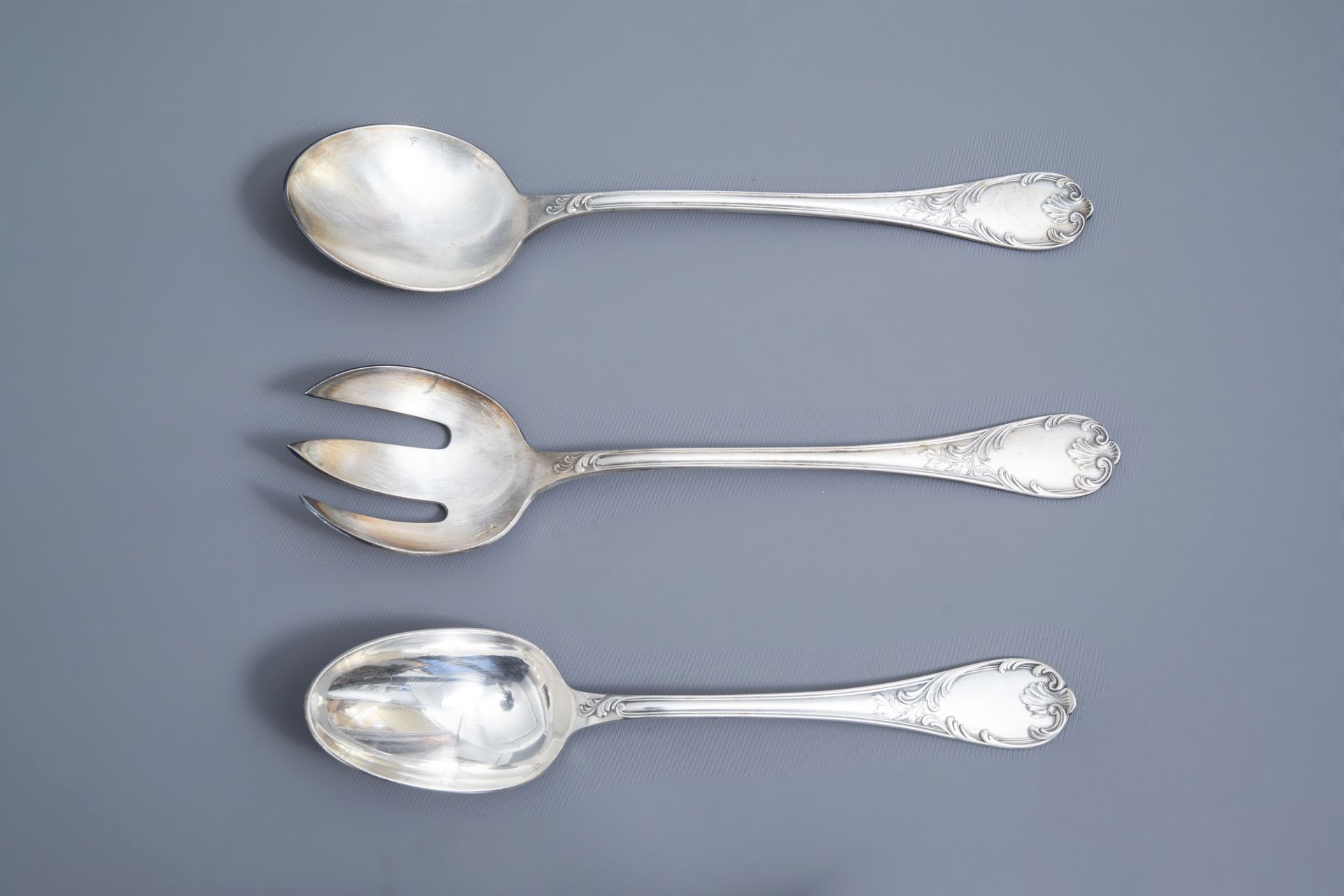 A French 65-piece silver plated rococo style cutlery set, model Marly, Christofle, 20th C. - Image 6 of 32