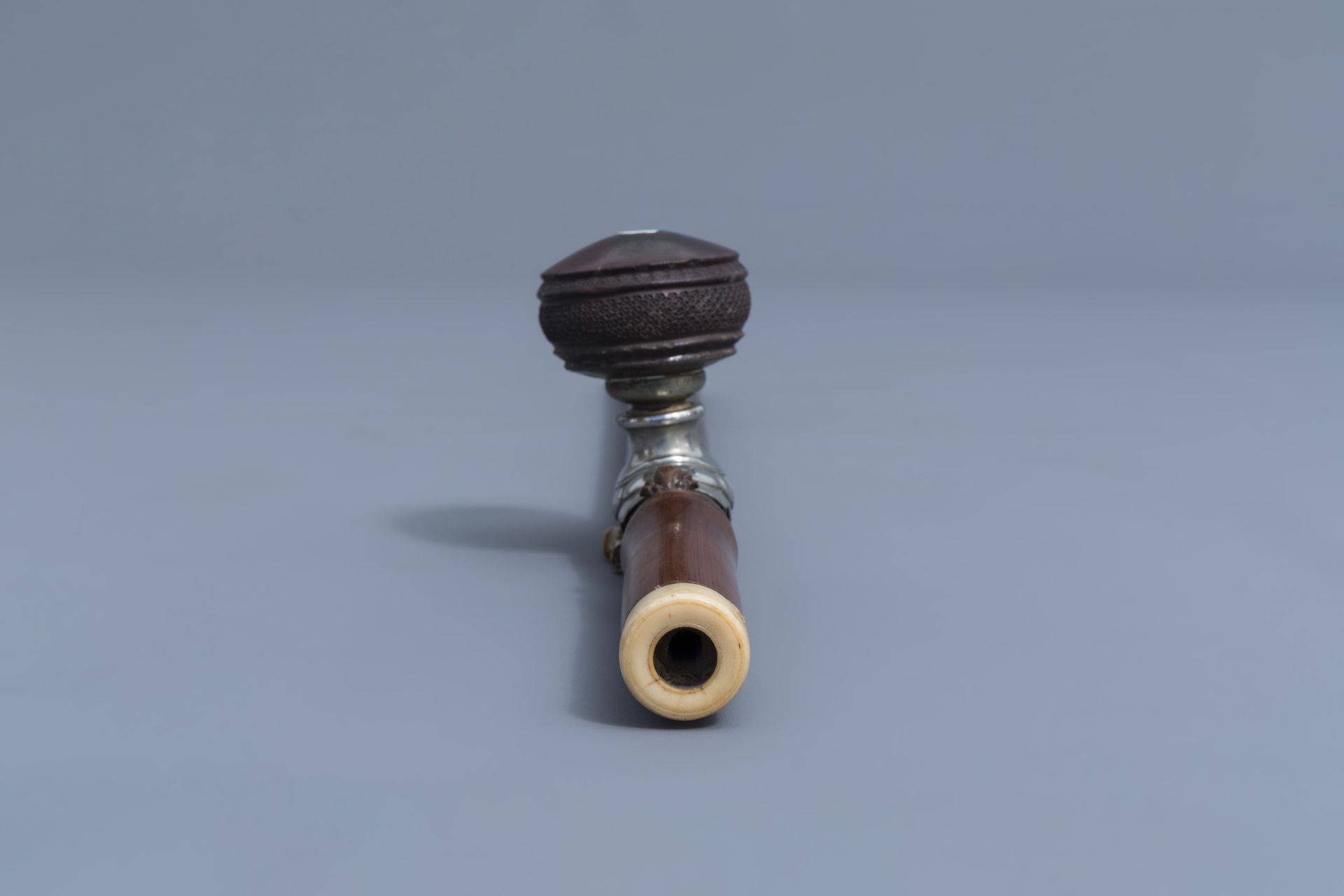 A Chinese bamboo opium pipe, an ivory mouth- and endpiece and a stoneware damper, 19th C. - Image 8 of 9