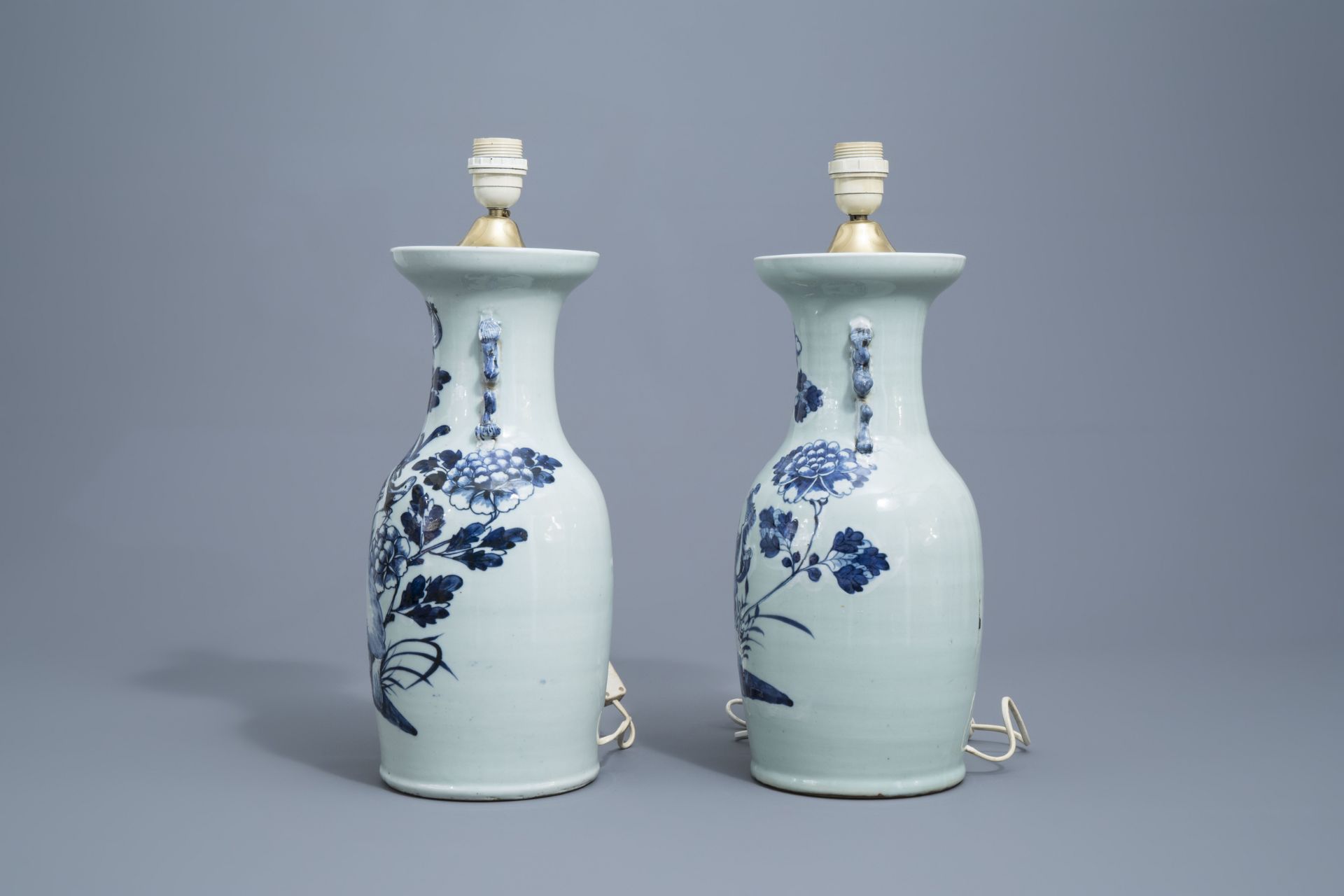 A Chinese blue and white landscape vase and four celadon vases, 19th/20th C. - Image 11 of 13