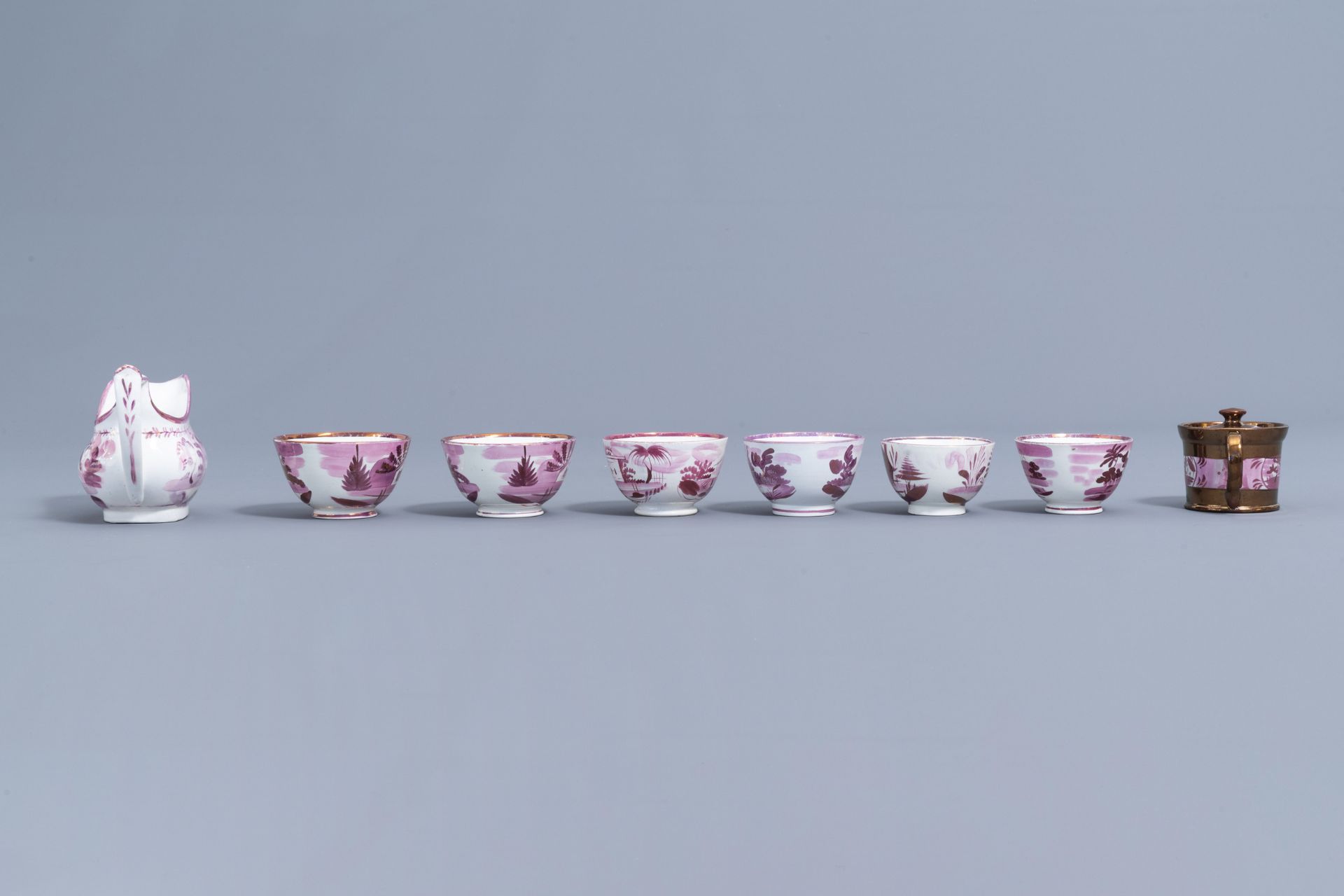 A varied collection of English pink lustreware items with a cottage in a landscape, 19th C. - Image 25 of 50