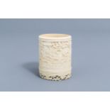 A Chinese richly carved ivory brush pot, Canton, 19th C.