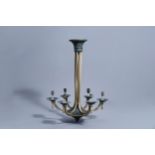 A French Petitot Art Deco gilt and patinated three-light chandelier, first half of the 20th C.
