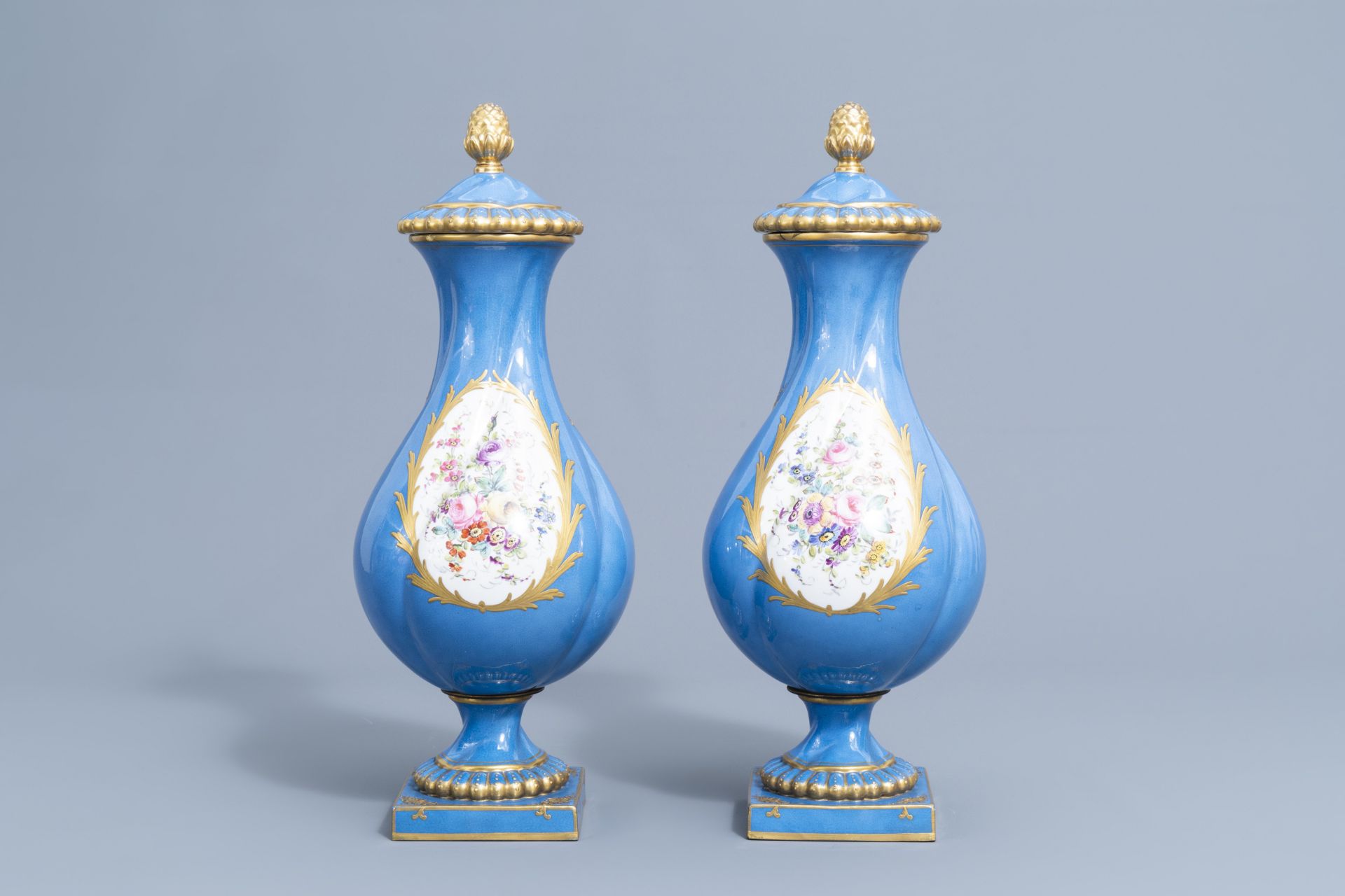 A pair of French 'bleu celeste' Svres manner vases and an Empire style centrepiece, 19th/20th C. - Image 8 of 28