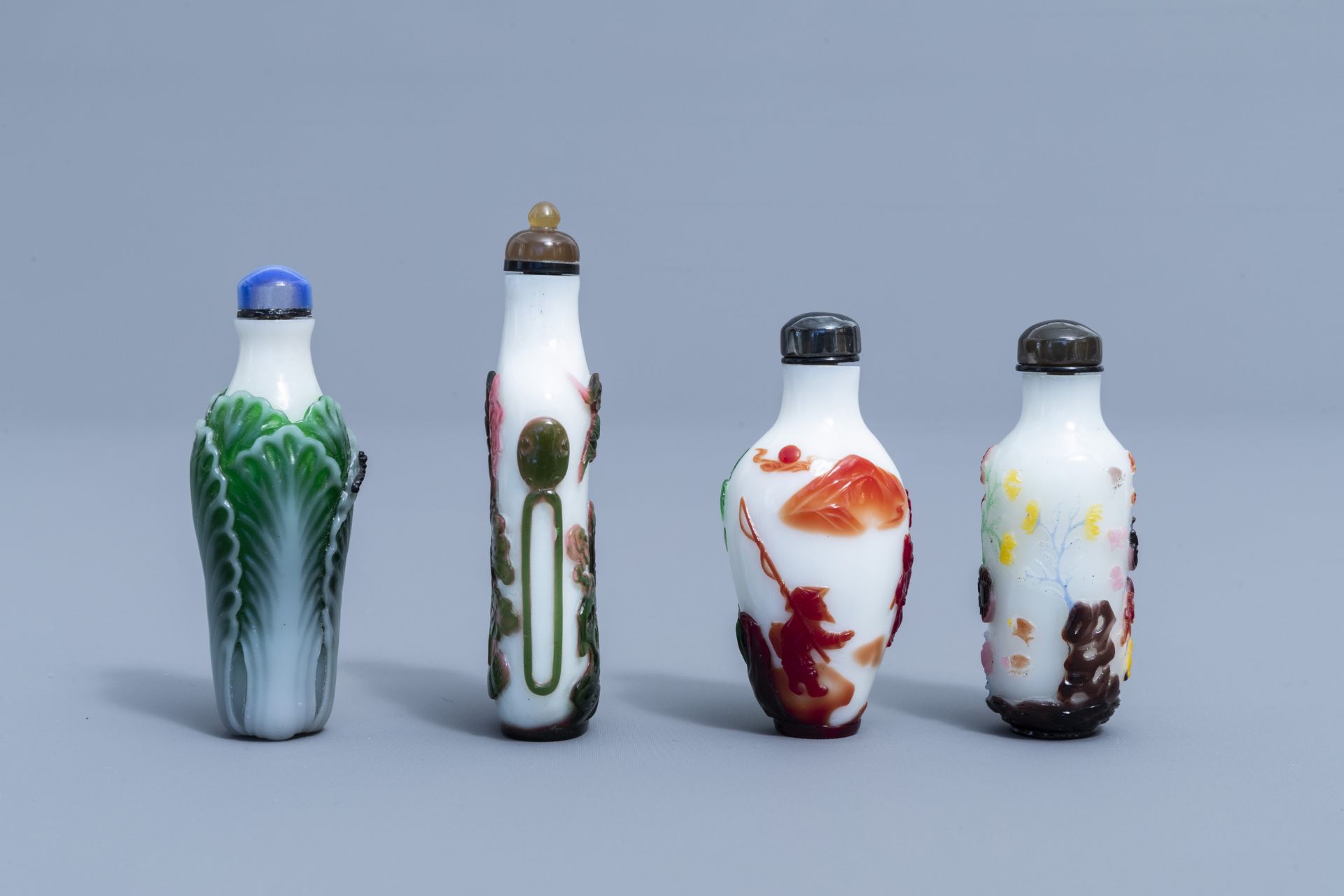 Eight Chinese overlay glass snuff bottles, 20th C. - Image 2 of 4