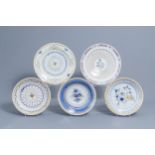 Five polychrome Brussels faience plates with floral design, 18th/19th C.