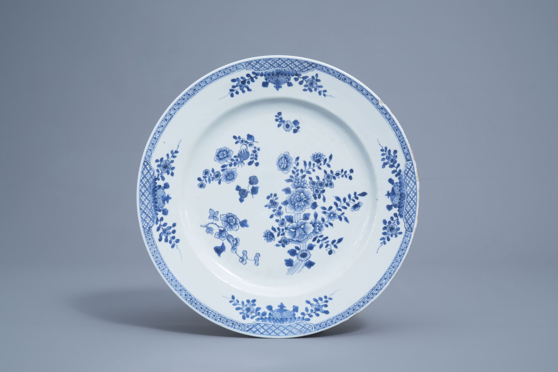 A Chinese blue and white charger and a gu 'Immortals' vase, Kangxi mark, 18th/19th C. - Image 4 of 18