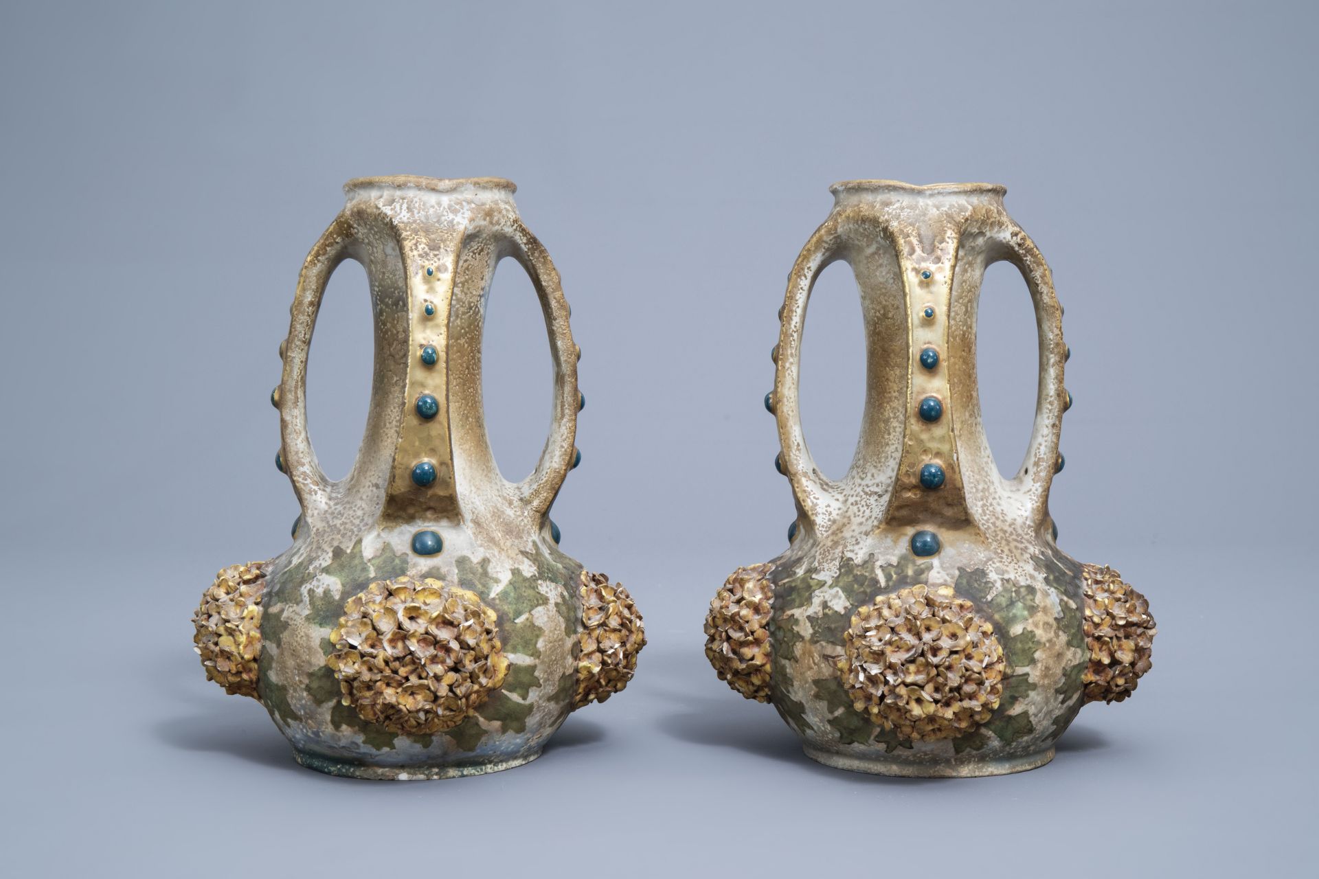 A pair of polychrome, gilt and iridescent Amphora Austria Art Nouveau vases, early 20th C. - Image 9 of 20