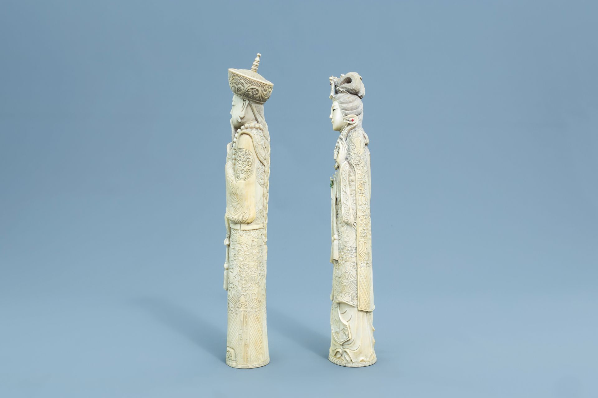 A pair of Chinese inlaid carved ivory figures of the emperor couple, first half of the 20th C. - Image 4 of 8