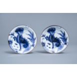 A pair of Japanese blue and white 'komainu' saucer dishes, marked, Edo, 18th C.