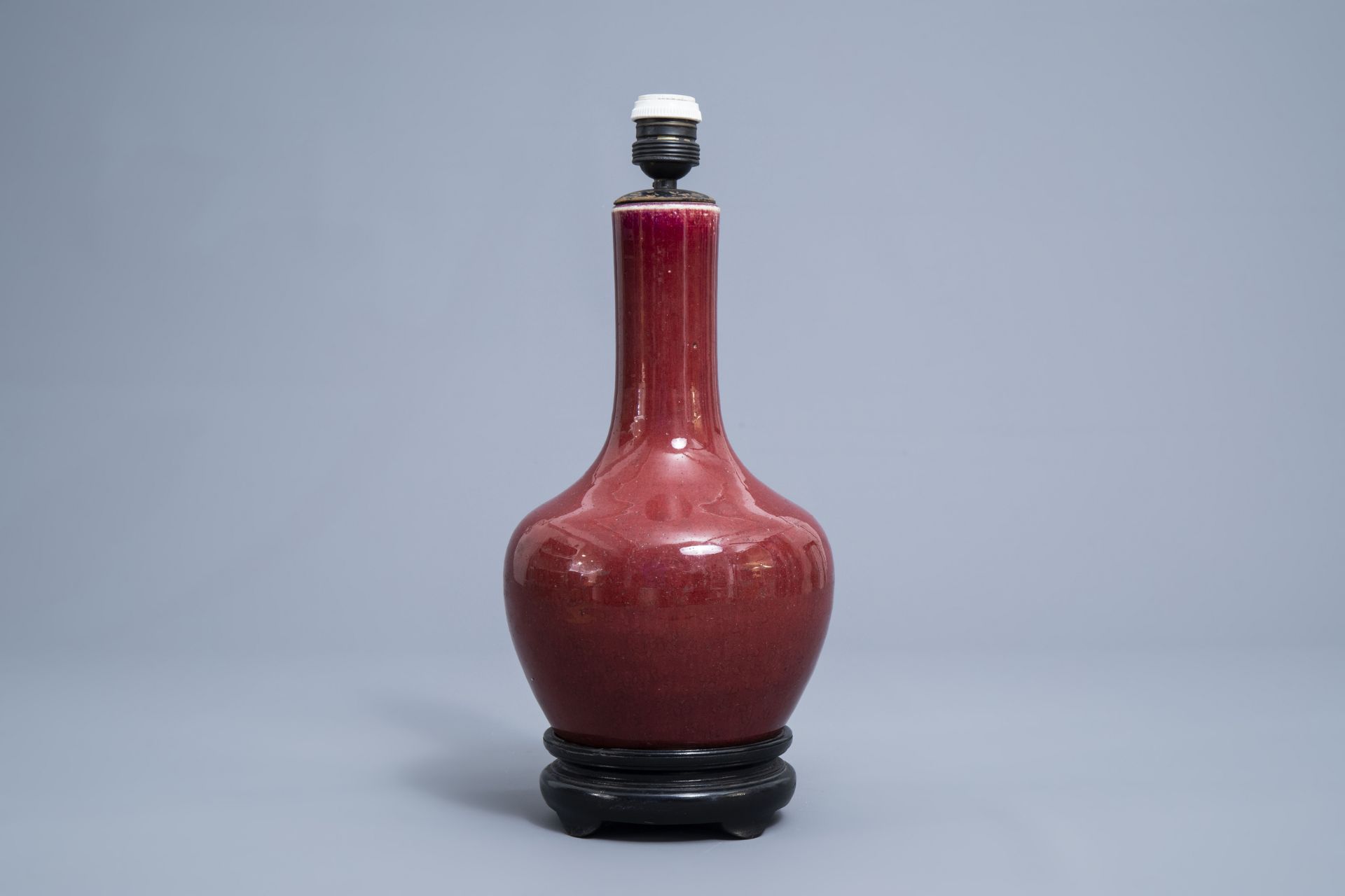 A Chinese monochrome sang de boeuf lamp-mounted bottle vase, 19th C. - Image 2 of 7