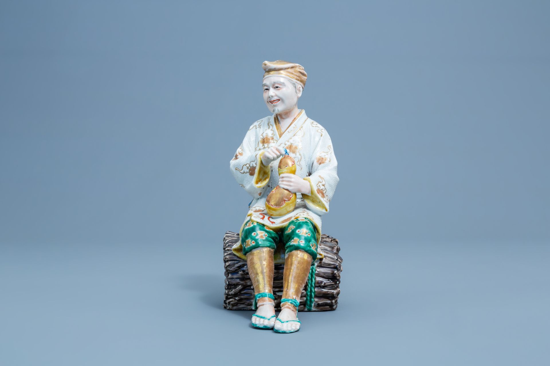 A Japanese Kutani model of a resting man, Meiji - Image 2 of 7
