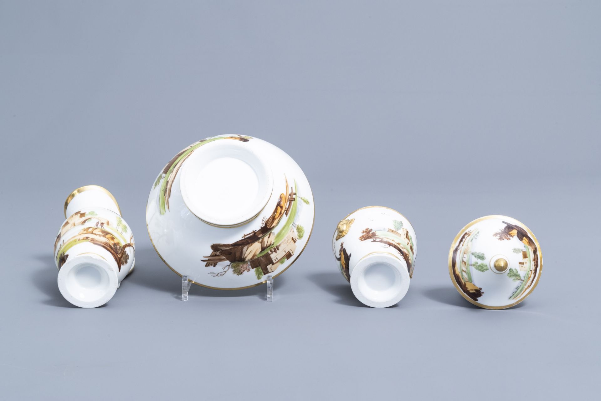 A 21-piece Paris polychrome and gilt porcelain coffee and tea service with landscapes, 19th C. - Image 25 of 46