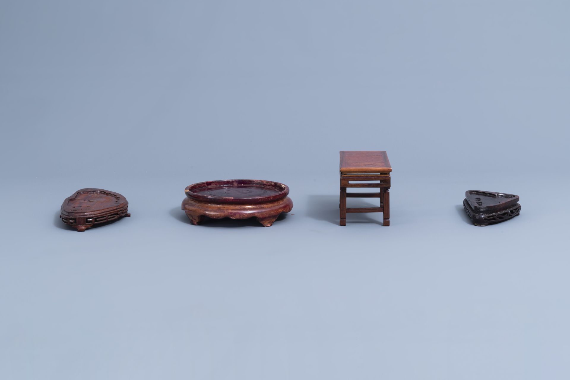 A collection of Chinese carved wooden stands, 19th/20th C. - Image 22 of 32