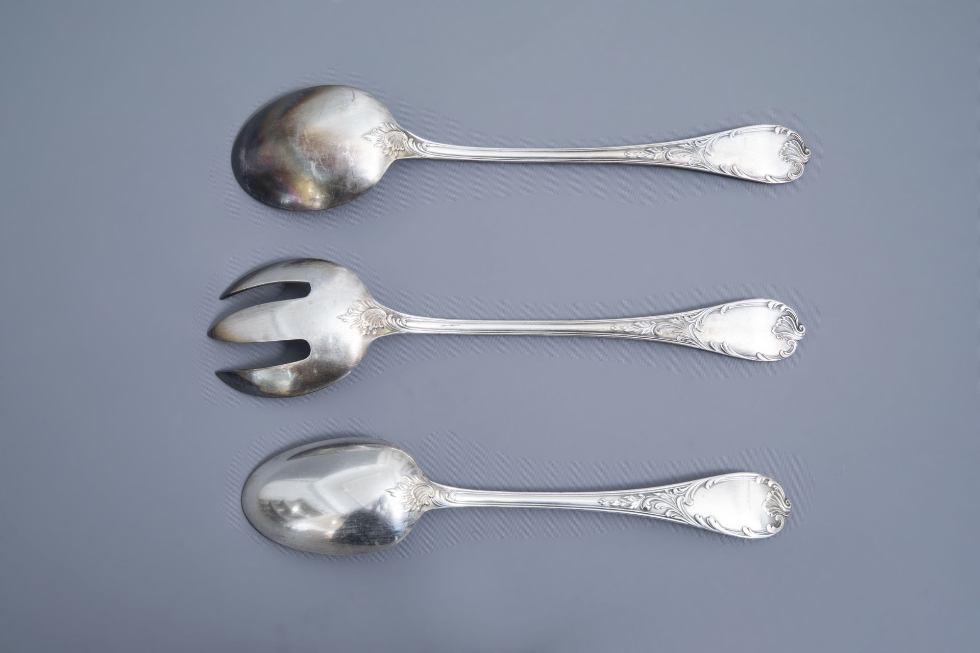 A French 65-piece silver plated rococo style cutlery set, model Marly, Christofle, 20th C. - Image 7 of 32