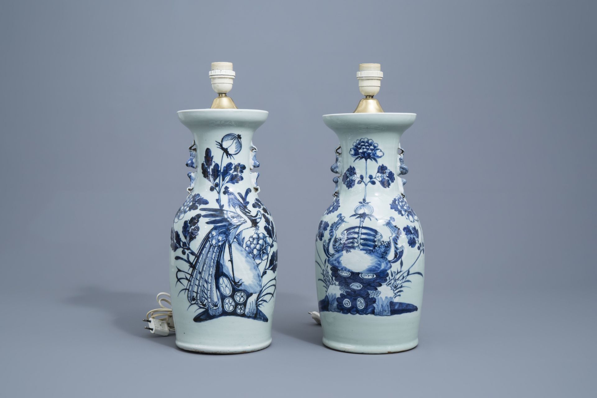 A Chinese blue and white landscape vase and four celadon vases, 19th/20th C. - Image 8 of 13