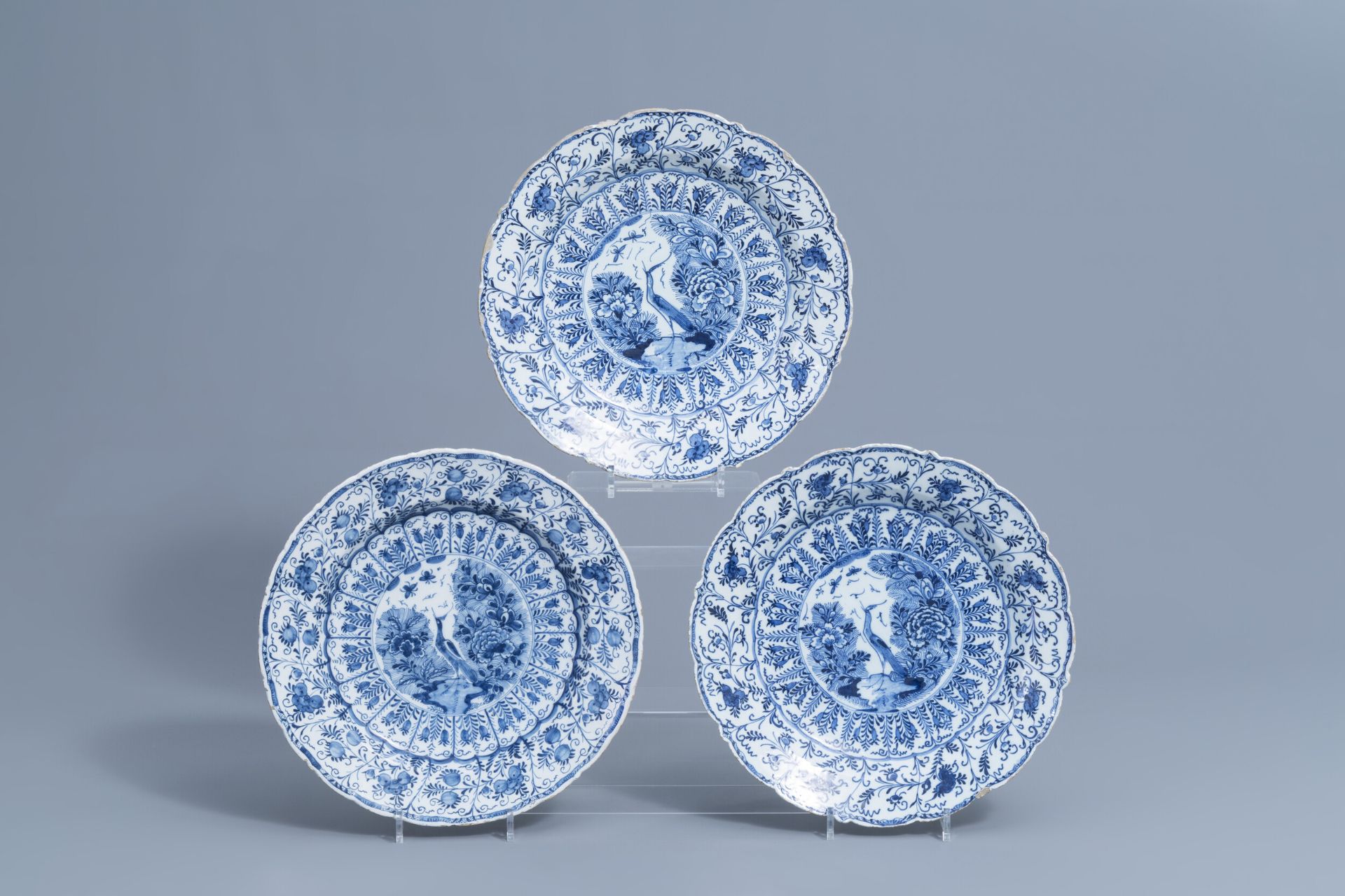 Three Dutch Delft blue and white 'birds of paradise' dishes, 18th C.