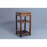 A Chinese wooden stand, 19th/20th C.