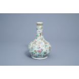 A Chinese Canton famille rose bottle vase with floral design, 19th C.