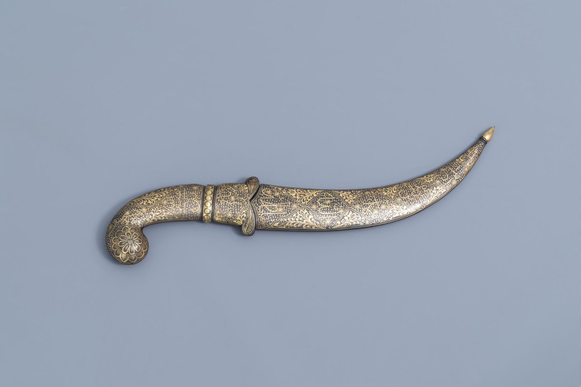 An Islamic inscribed 'jambiya' dagger with matching scabbard, Middle East, 20th C.