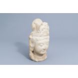 A Chinese white marble head of Guanyin, Northern Qi-style, 20th C.