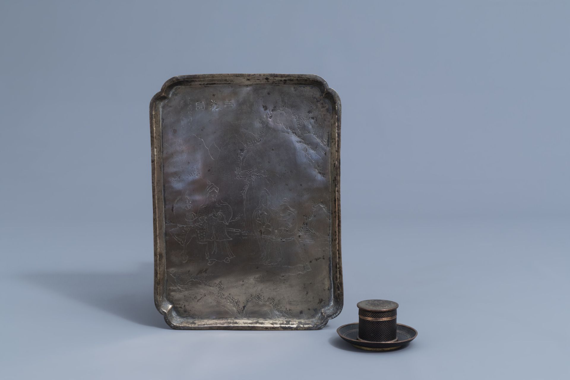 A Chinese brass opium tray with figures and a cloisonnŽ opium box and cover on stand, 19th C.