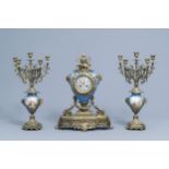 A French Historicism three-piece gilt mounted Sevres style clock garniture, 19th C.