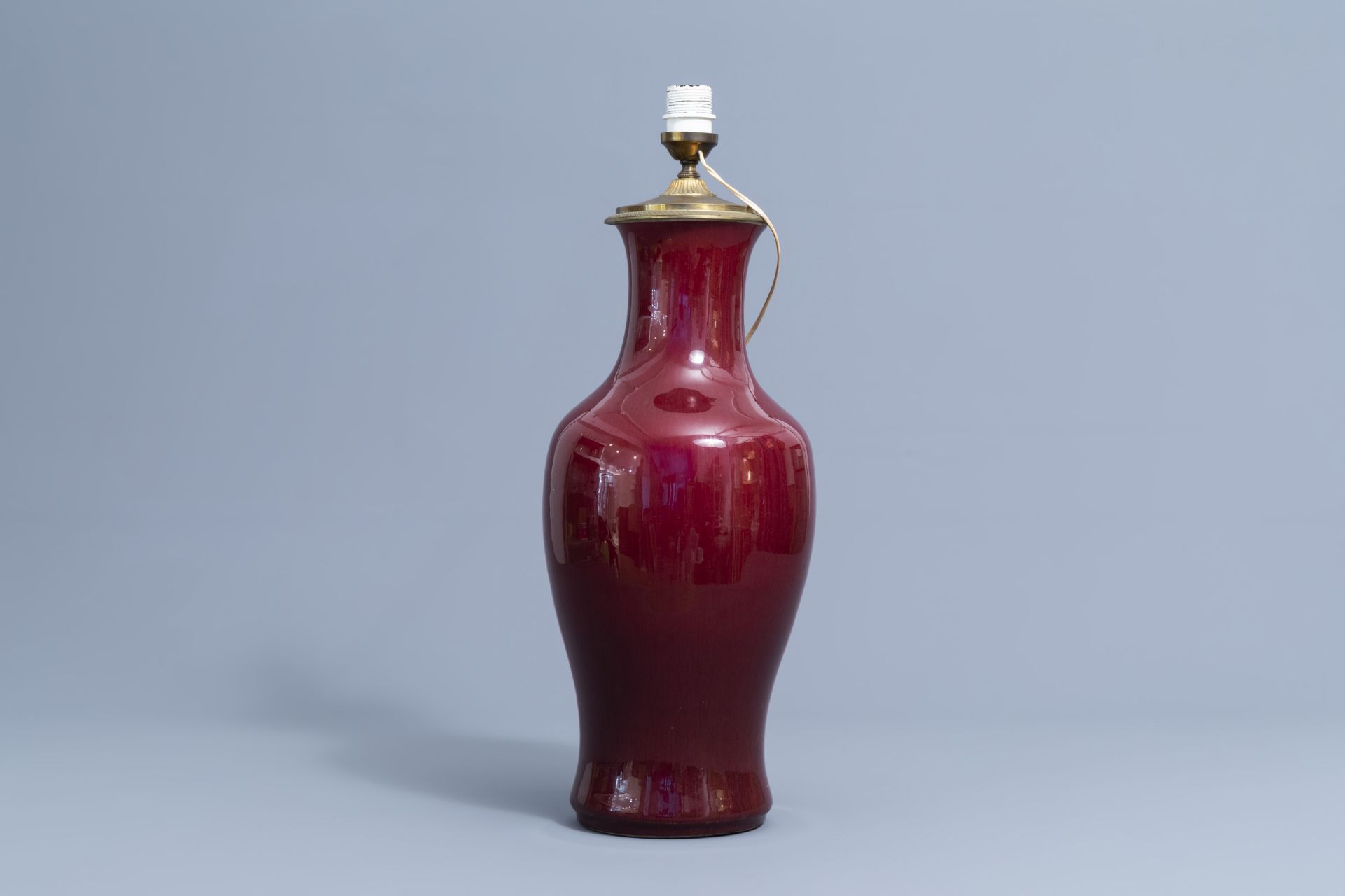 A Chinese monochrome sang de boeuf vase mounted as a lamp, 18th/19th C. - Image 3 of 6