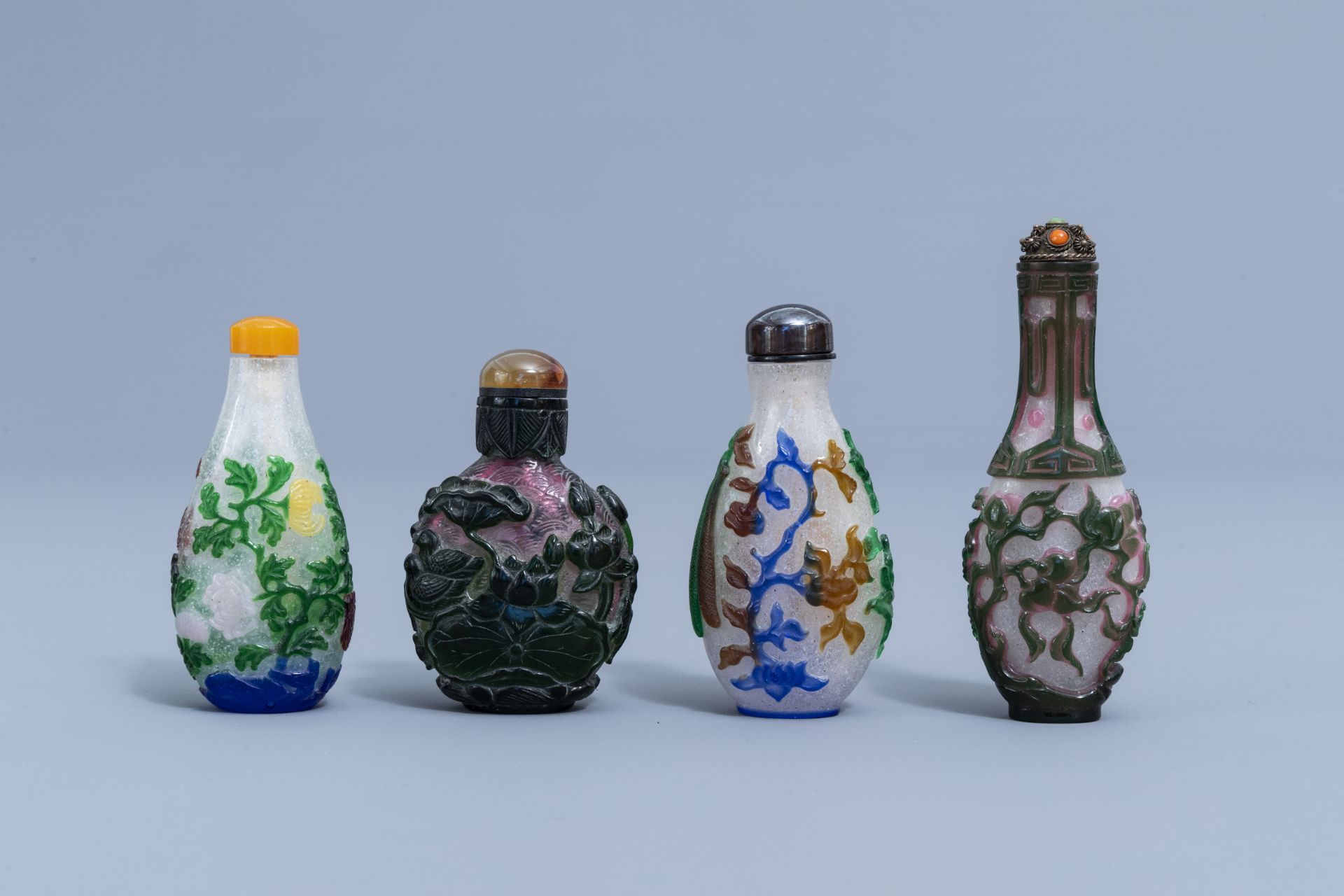 Eight Chinese multi-colour overlay glass snuff bottles, 20th C. - Image 3 of 4