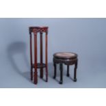 Two Chinese carved wooden stands with marble and cloisonnŽ tops, 20th C.