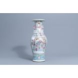 A Chinese famille rose 'court scene' vase, 19th C.