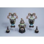 A Chinese cloisonne incense burner and two pairs of vases with dragon design, 20th C.