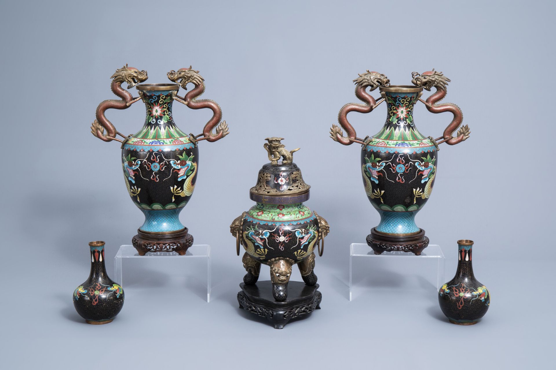 A Chinese cloisonne incense burner and two pairs of vases with dragon design, 20th C.