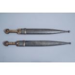 Two Caucasian 'kindjal' daggers with accompanying scabbard, 19th/20th C.