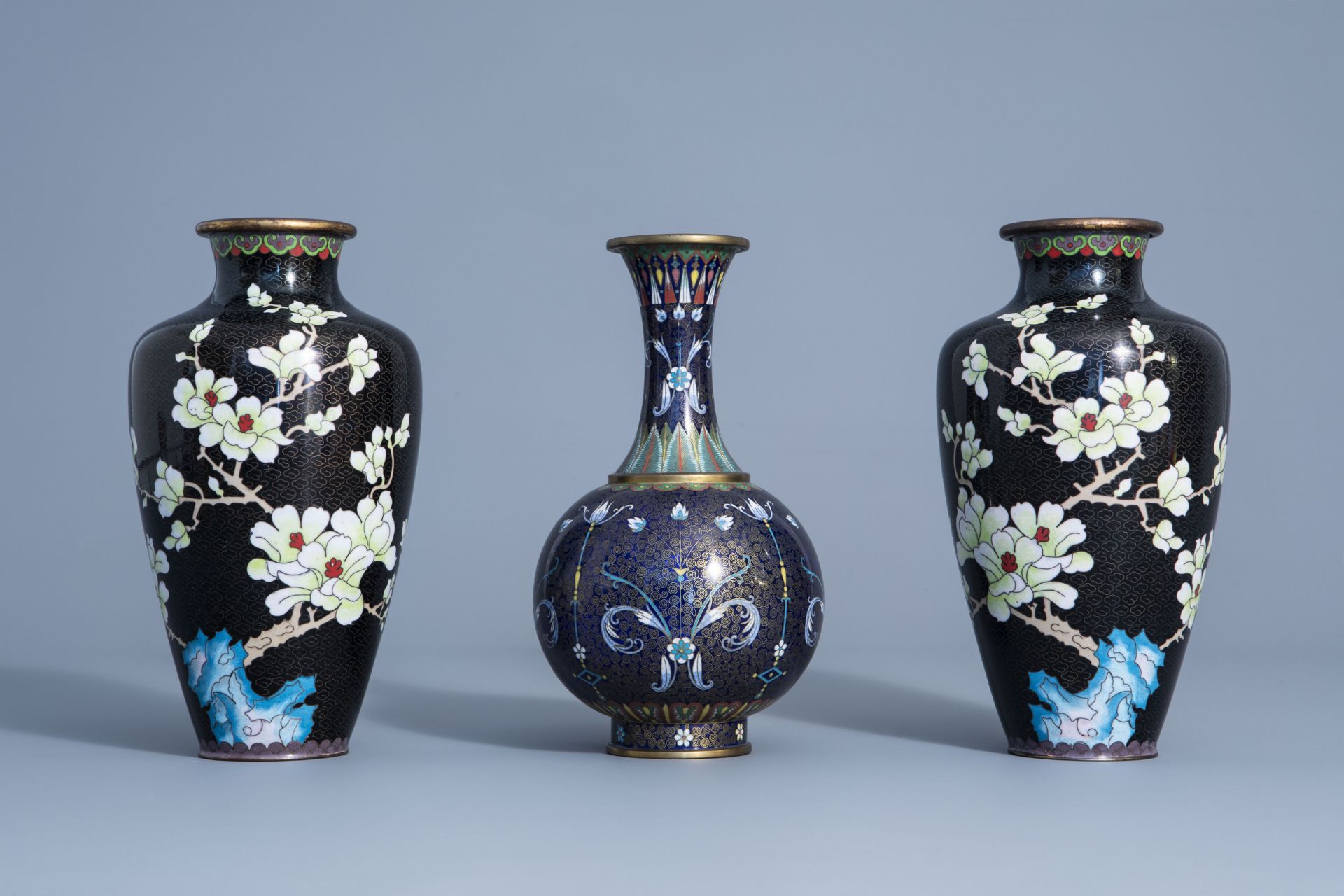 A pair of Chinese cloisonne vases with floral design and a bottle vase, 19/20th C. - Image 2 of 7