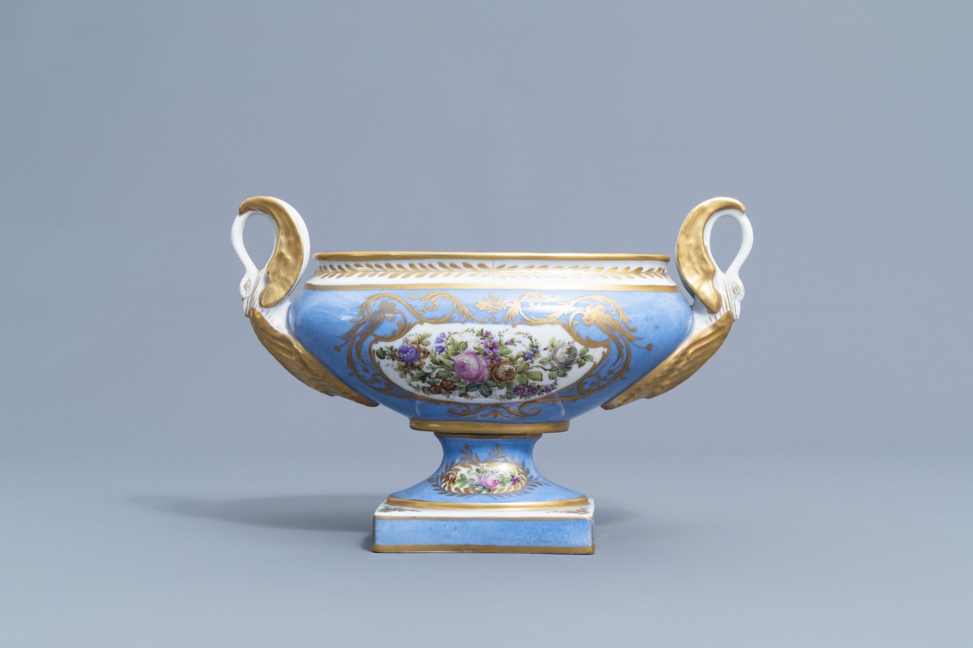 A pair of French 'bleu celeste' Svres manner vases and an Empire style centrepiece, 19th/20th C. - Image 21 of 28