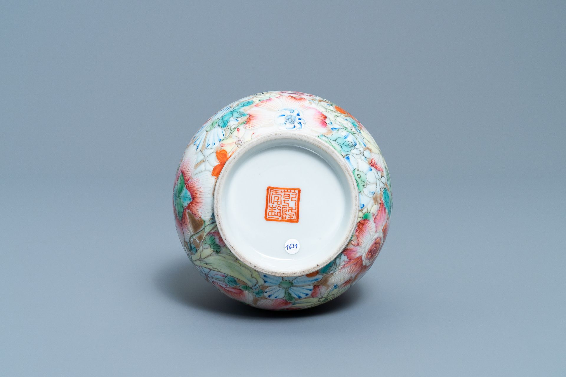 A Chinese famille rose 'millefleurs' vase, Qianlong mark, Republic, 20th C. - Image 6 of 6