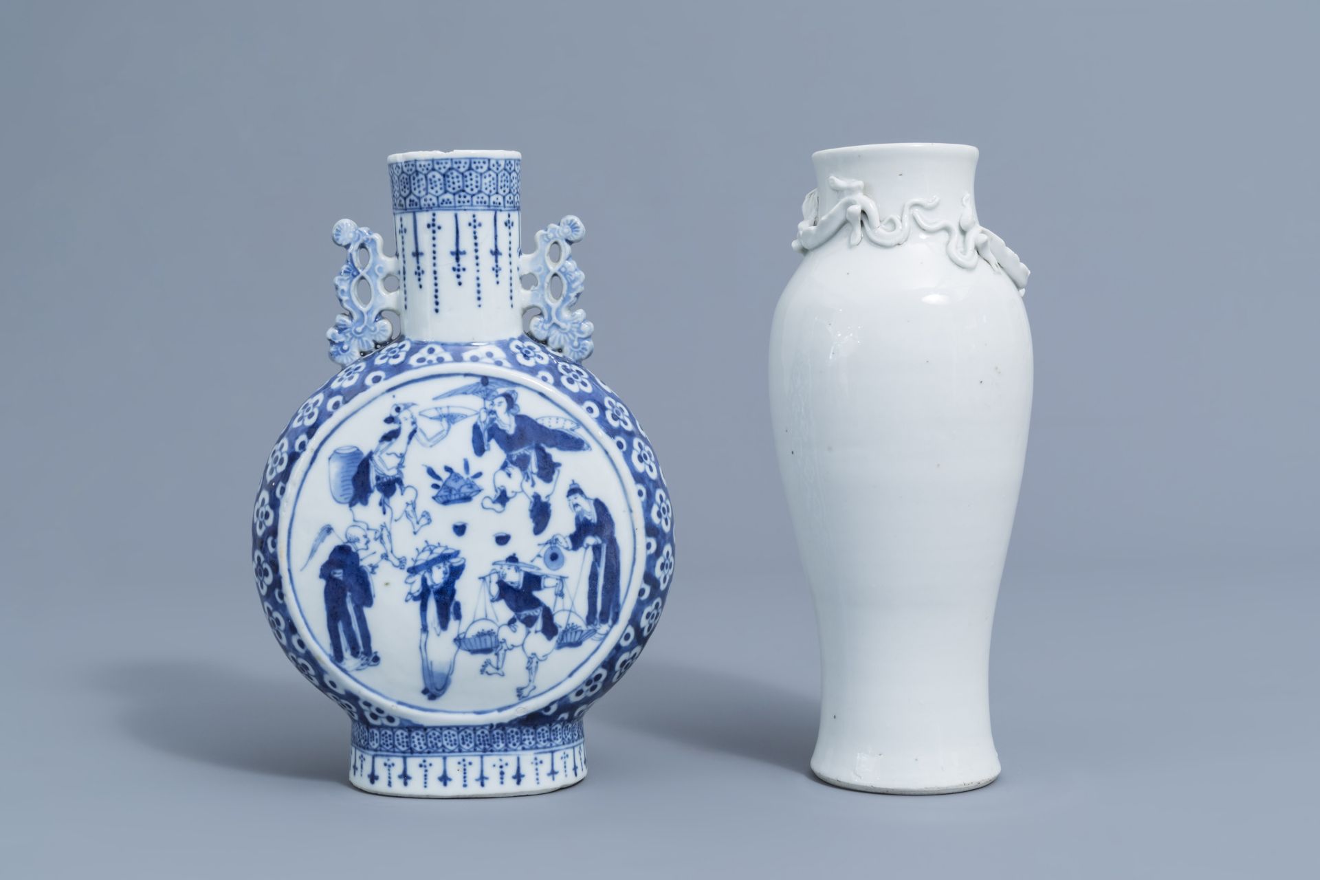 A Chinese blue and white moonflask and a blanc de Chine vase with dragon relief design, 19th C. - Image 3 of 6