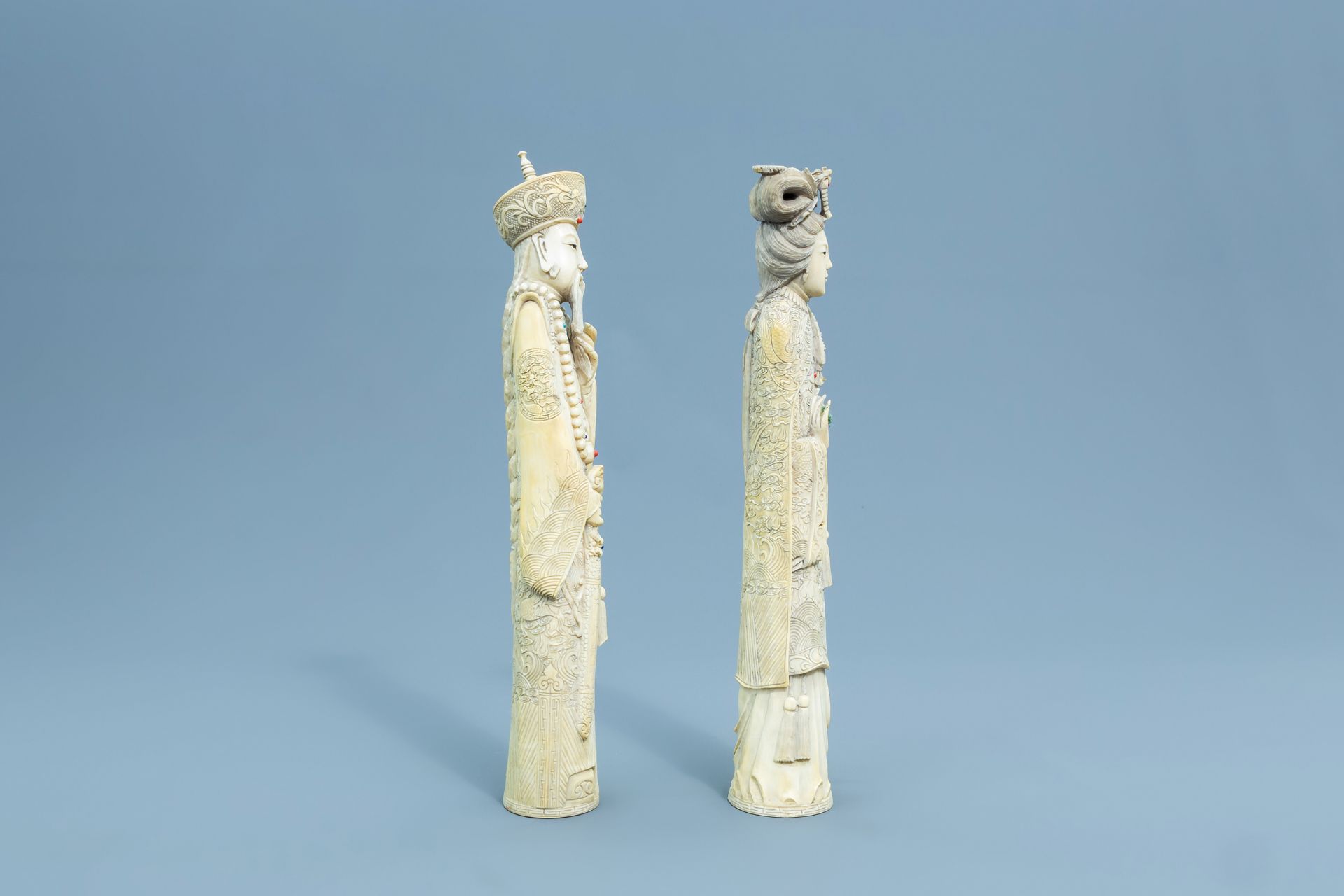 A pair of Chinese inlaid carved ivory figures of the emperor couple, first half of the 20th C. - Image 2 of 8