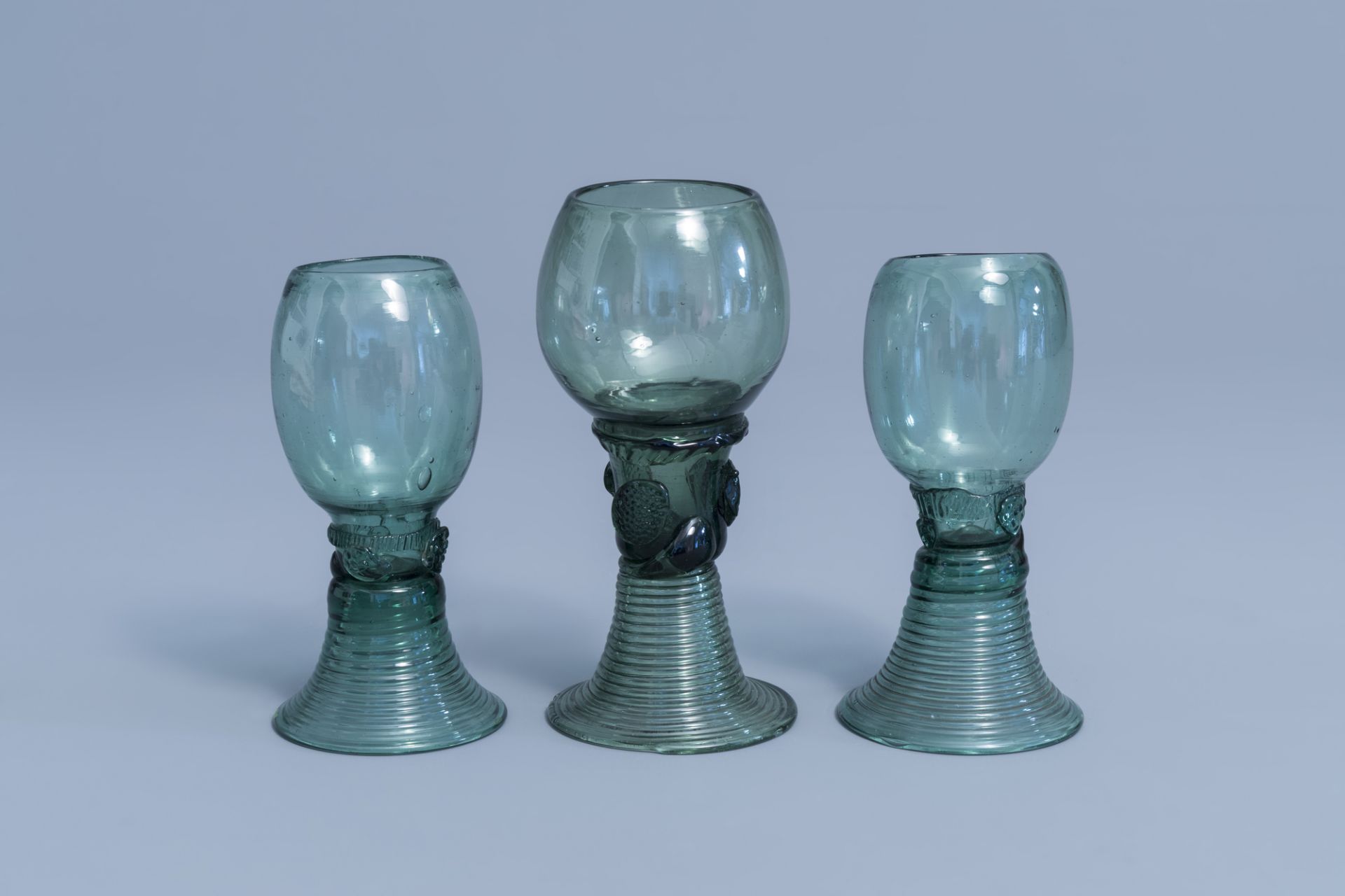 Three Dutch waldglas roemers with raspberry prunts, 18th/19th C.