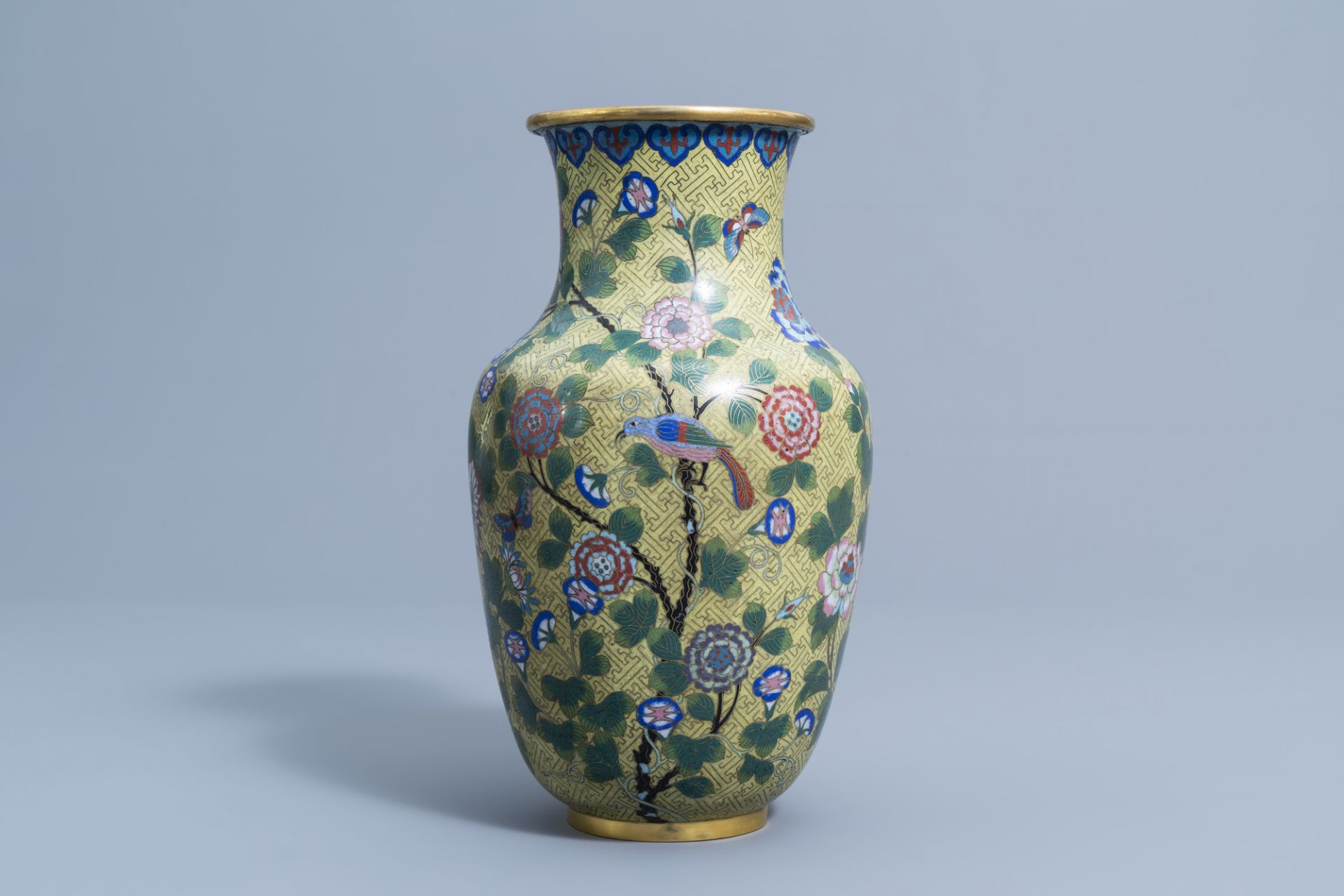 A Chinese cloisonne vase with a bird and butterflies among blossoming branches, Jiaqing