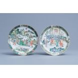 Two Chinese Canton famille verte plates with figures on a terrace, 19th C.