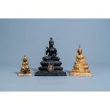 Three gilt and patinated bronze figures of Buddha, Southeast Asia, 19th/20th C.