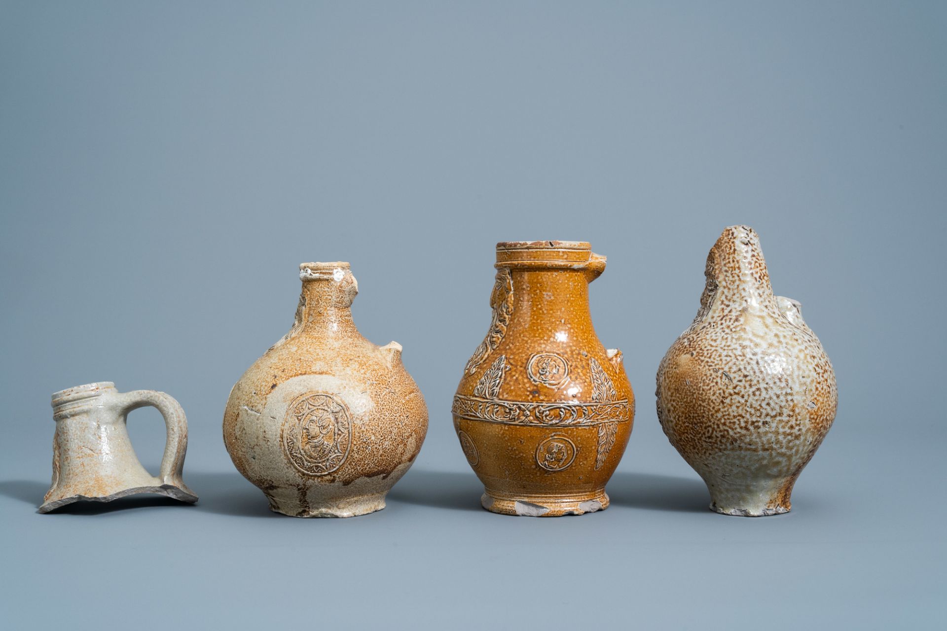 Three German stoneware bellarmine jugs and a neck fragment, 16th/17th C. - Image 3 of 8