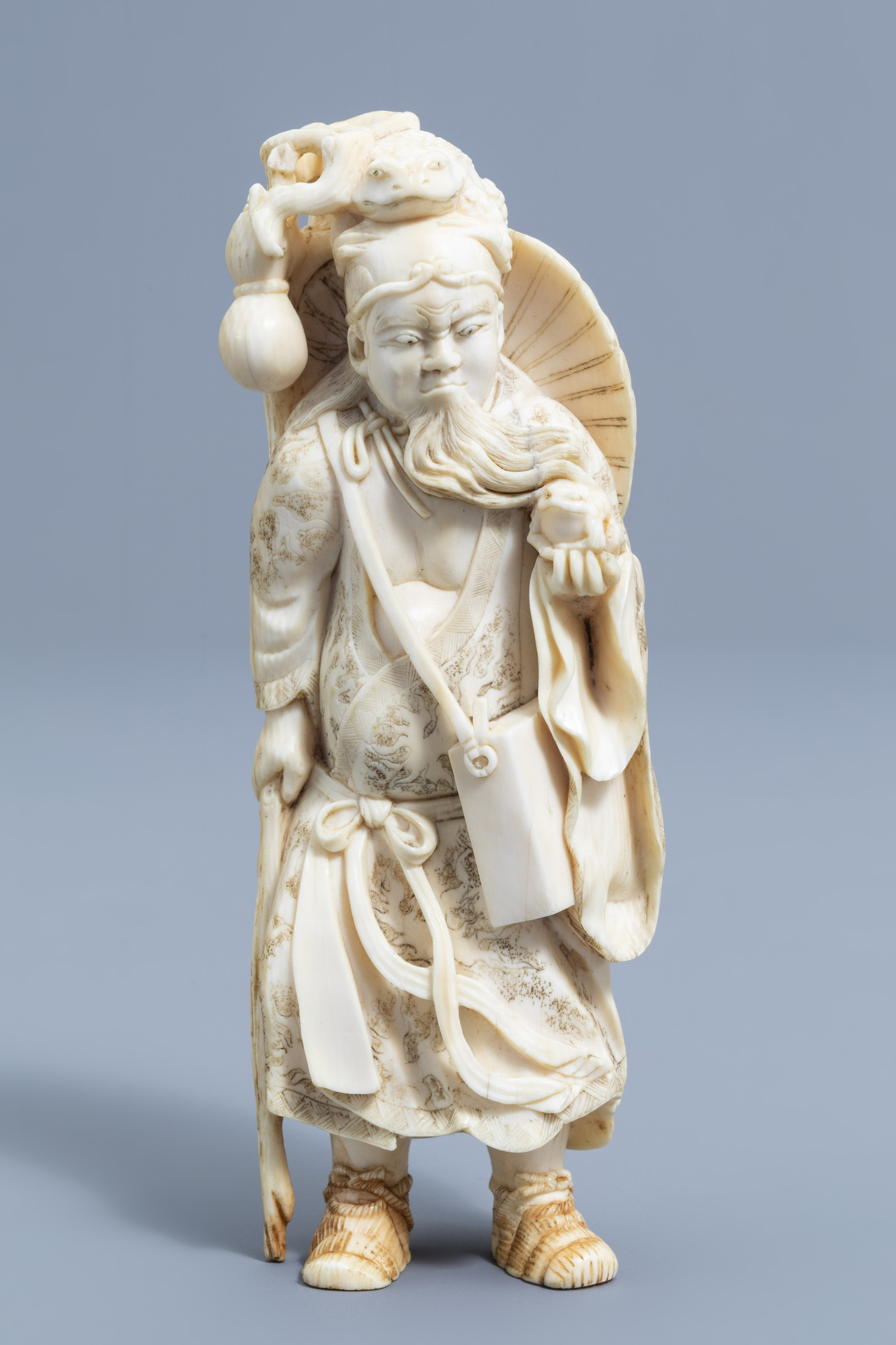 A Japanese ivory okimono of Gama Sennin, Meiji, 19th C. - Image 9 of 11