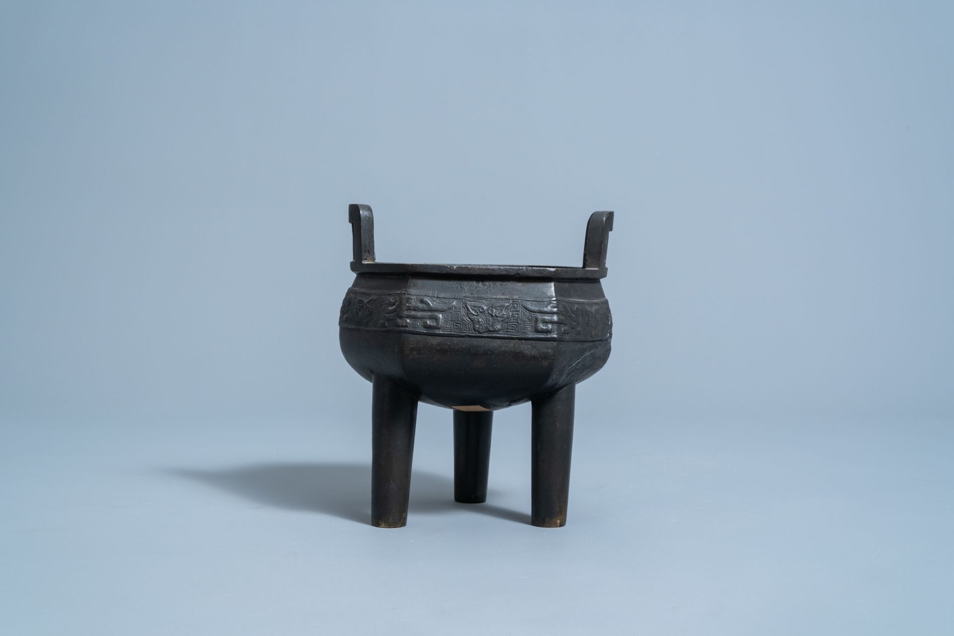 A Chinese bronze tripod censer with wooden cover and stand, Ming - Image 2 of 7